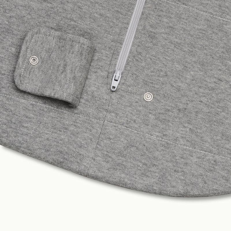 zoomed in on two-way bottom zipper on sleeping bag in heather gray