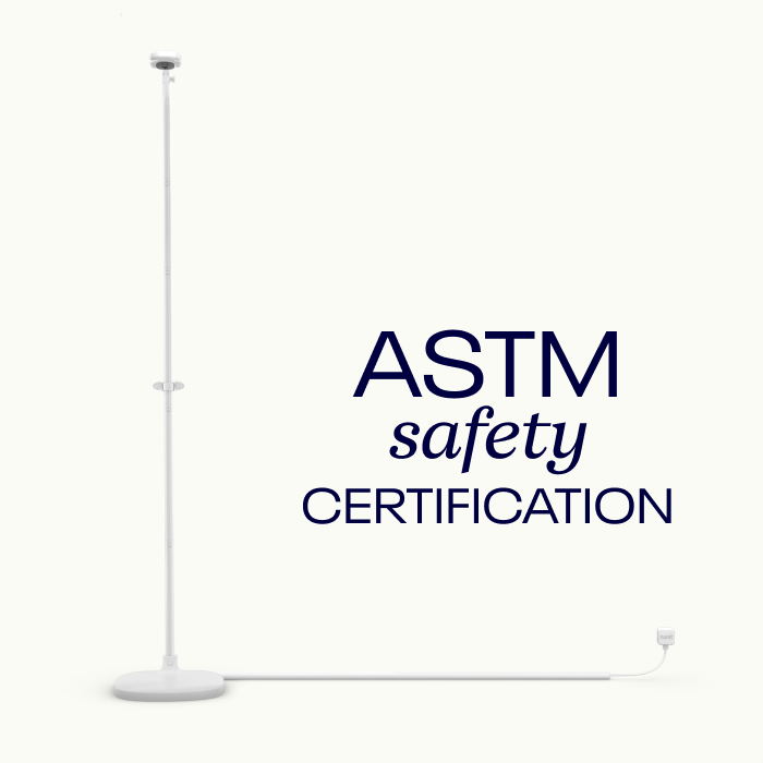 nanit pro camera + floor stand full view with power plugged in and cable covered - ASTM safety certification #mount_floor stand
