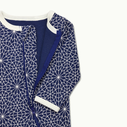 zoomed in on front view of pajama protective chin zipper guard in bright star 