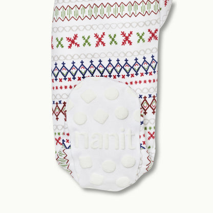 zoomed in on right feet in front view of sleep wear pajamas in fair isle showing signature foot gripper 