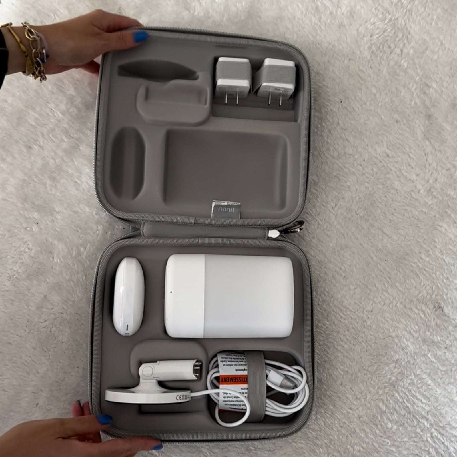 inside nanit traveling light case - nanit pro camera head, flex stand, and nanit sound + light