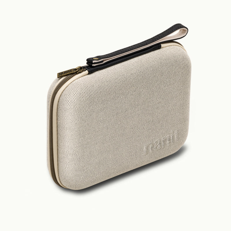 angled image of two tone canvas travel case 