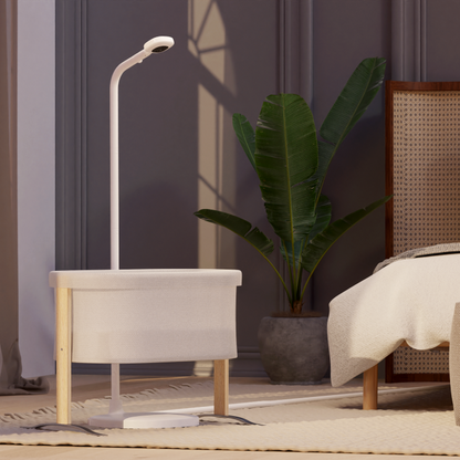 nanit pro camera + floor stand placed in front of small crib in bedroom #mount_floor stand